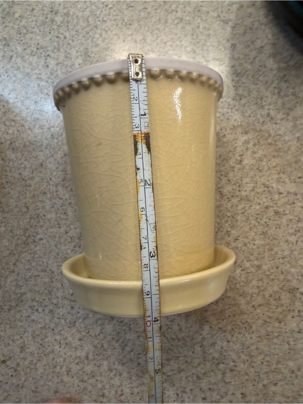 Small yellow ceramic flower pot